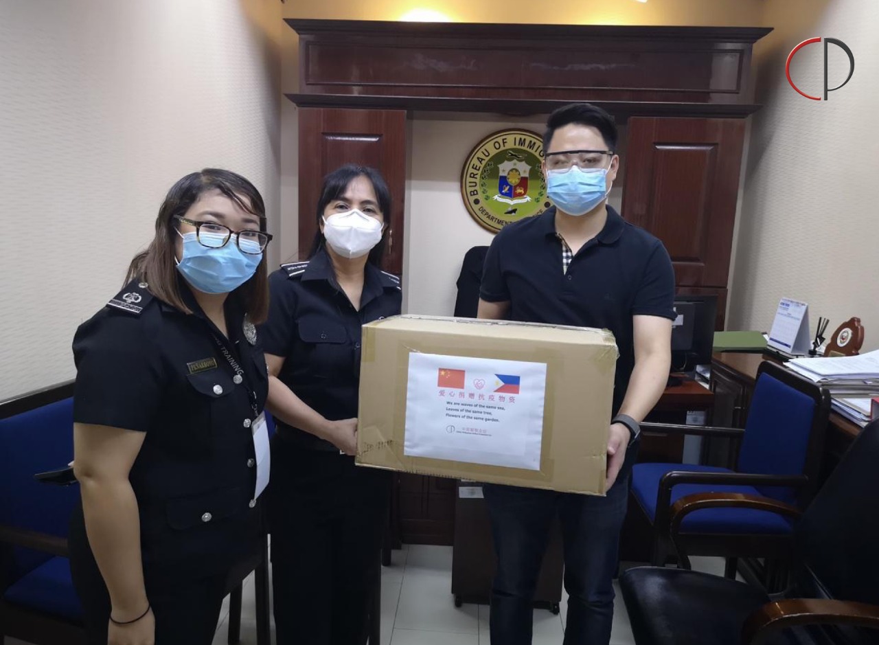 CPU President Michael Ma handing over PPEs to the Bureau of Immigration office, Manila.